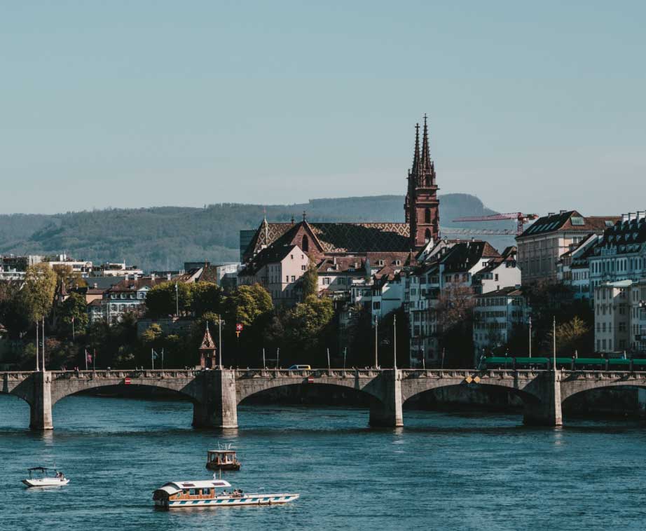 The Rhine at Basel, with the Minster rising behind the Mittlere Brücke.